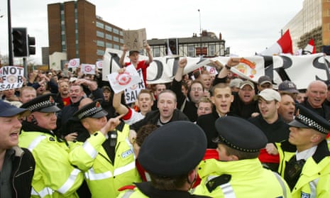 Manchester United fans demonstrate against Malcolm Glazer in October 2004.