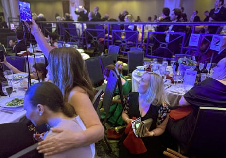 Guests watch from tables after U.S. President Donald Trump and first lady Melania Trump were rushed out of the White House Correspondents’ Association dinner by Secret Service agents after a loud, unidentified noise, in Washington, D.C., U.S. April 25, 2026.