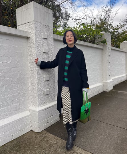 When both the skirt and coat fall at a similar height, it makes the coat look full-length.