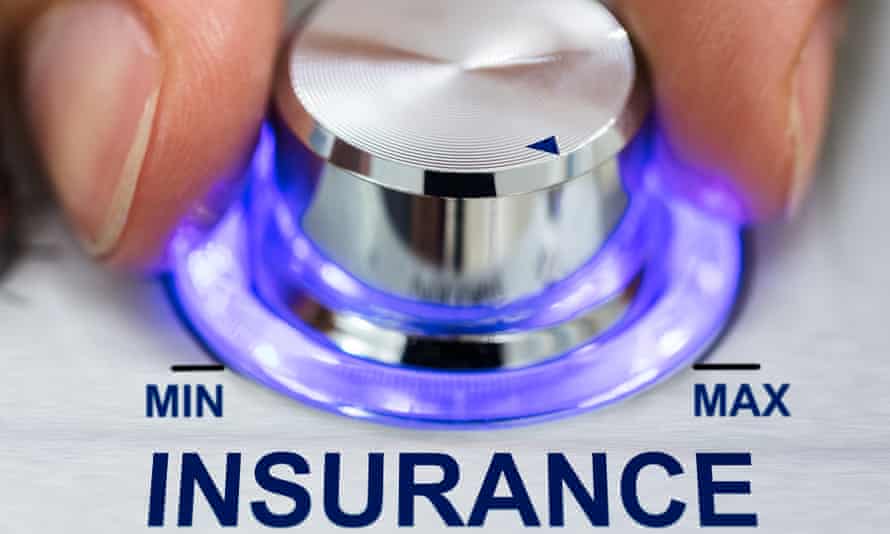 A hand turning the glowing metallic button with the text Insurance