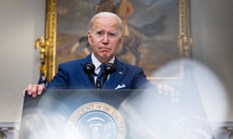 Joe Biden stands at a lectern in the White House to address the nation.