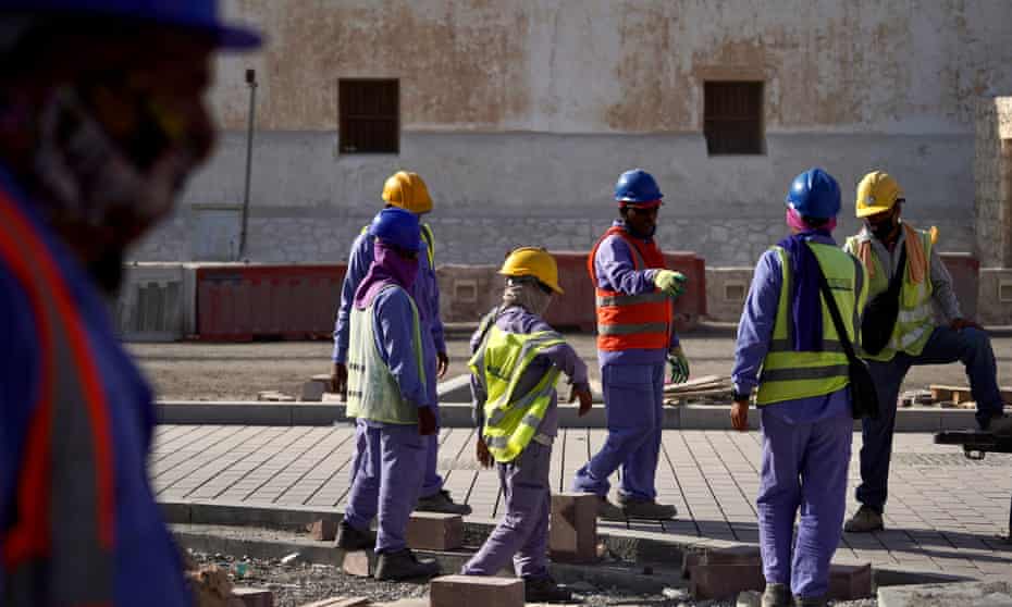 Construction workers near Souq Waqif in Doha, Qatar