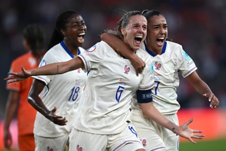 Sandie Toletti (left) celebrates after scoring the first goal of the game for France.