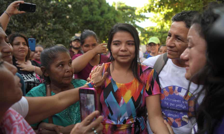 Imelda Cortez, centre, is accompanied by relatives after she was acquitted and released, outside the judicial centre for sentencing in Usulután, El Salvador.