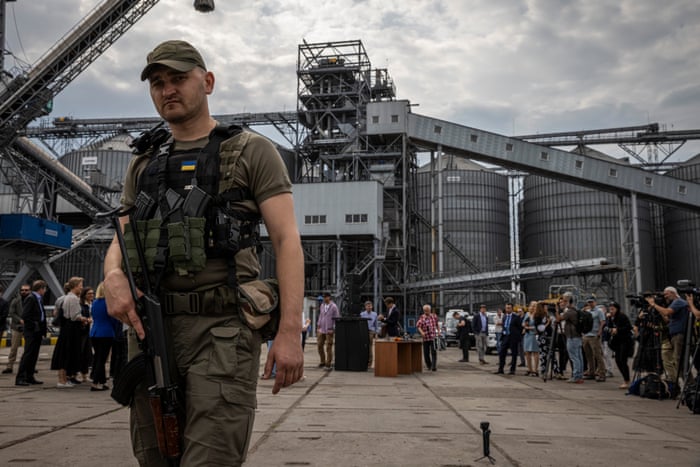 A security guard stands infront of a press conference infront of The Navi-Star in Odesa on Friday, 29 July 2022.