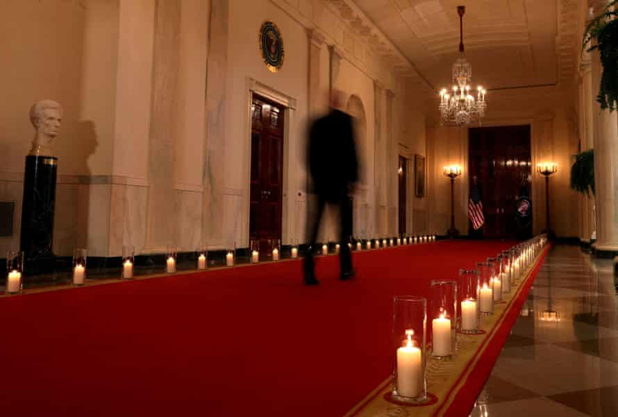 Biden walks through candles