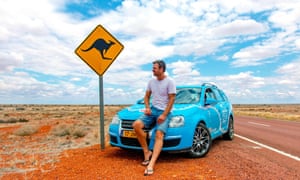 Wiebe Wakker with the electric car he made a round-the-world trip in. Electric vehicles have become a point of difference between the Coalition and Labor in the Australian election.
