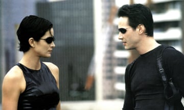 Stay woke … Carrie-Anne Moss and Keanu Reeves in The Matrix.