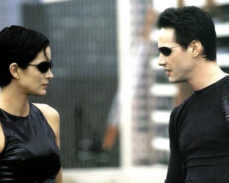 Stay woke … Carrie-Anne Moss and Keanu Reeves in The Matrix.