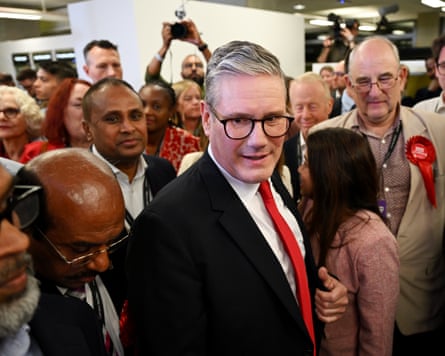 Starmer surrounded by crowds of Labour activists at the count for his constituency in the early hours of 5 July 2024