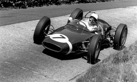 Stirling Moss driving a Lotus-Climax 18 in the German Grand Prix at the Nürburgring, 1961.