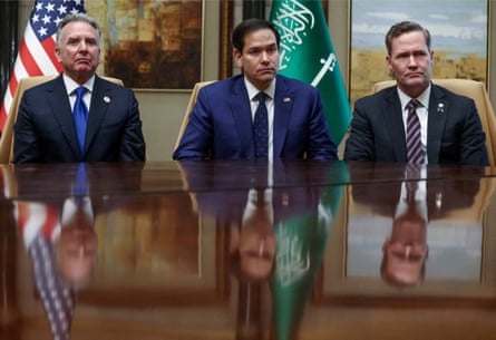 Steve Witkoff, Marco Rubio and Mike Waltz sit at a table