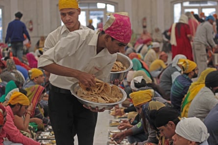 Food being served at the langar at Bangla Sahib gurdwara in New Delhi in 2018.