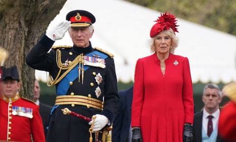 King Charles and Camilla at a military standards ceremony at Buckingham Palace on 27 April 2023.