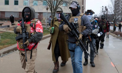 Members of the ‘Boogaloo Bois’ protest against the election of Joe Biden in Lansing, Michigan, on 17 January. 
