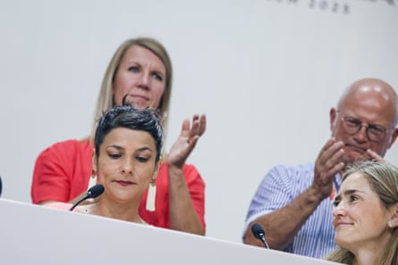 Irene Vélez Torres looks down as others applaud behind her at Cop30