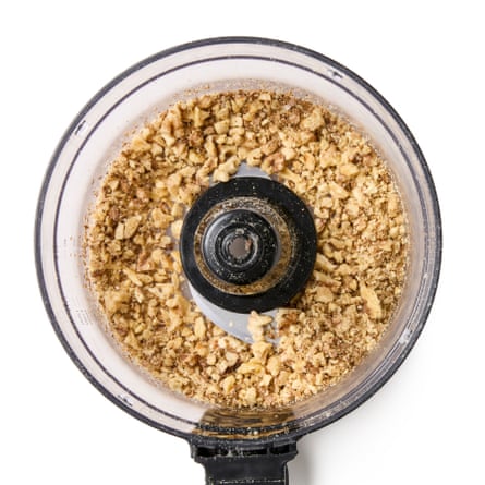 Use a food processor (or the end of rolling pin and a plastic bag) to smash the biscuits into uneven crumbs;