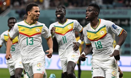 Senegal's forward Ismaïla Sarr (right) celebrates scoring in the victory over Ecuador in Doha.