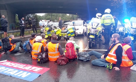 Protesters from Insulate Britain blocking  a roundabout at Junction 3 of the M4 near Heathrow, west London last Friday.