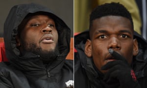 Manchester United's Romalu Lukaku and Paul Pogba have watched the bench jury.