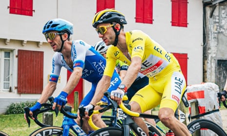 Adam Yates, pictured here riding alongside his twin brother Simon, will spend his fourth consecutive day in the yellow jersey today.