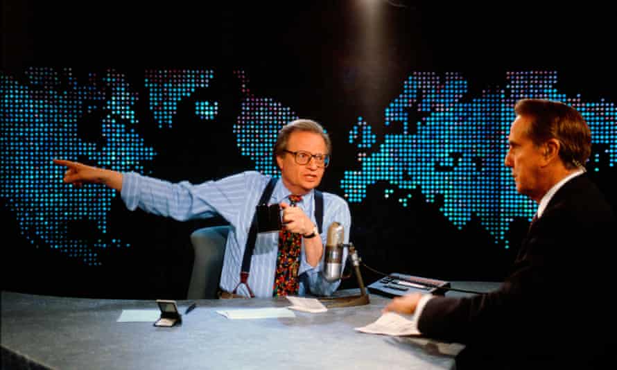 King interviewing Bob Dole, the Republican presidential candidate in 1996, on his 1994 show.