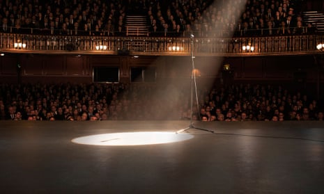 File photo of a spotlight shining on a theatre stage
