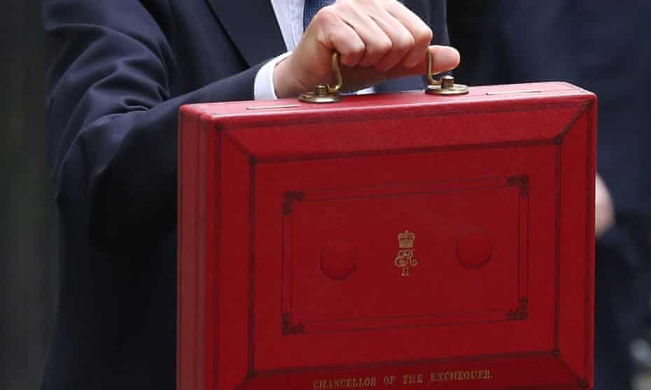 Philip Hammond holds his red budget box.