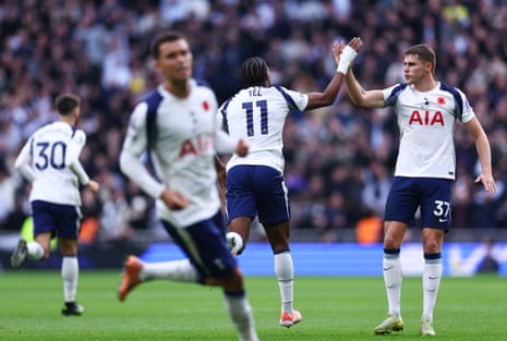 Mathys Tel accepts the congratulations of Micky van de Ven after equalising for Spurs against Manchester United.