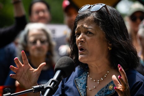 A woman speaks into a mic