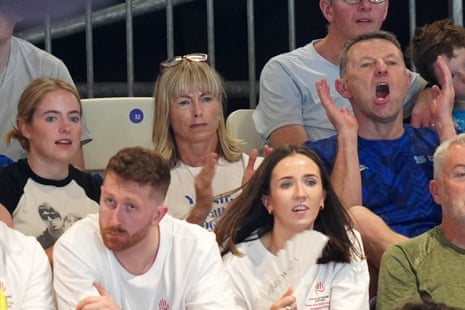 Sean McCann’s sister Amelie, mother Kate and father Gerry cheer him on during the 400 metres freestyle.