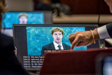 Mark Zuckerberg’s image can be seen on a screen