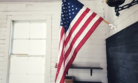 An American flag in a school house.