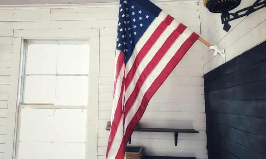 An American flag in a school house.