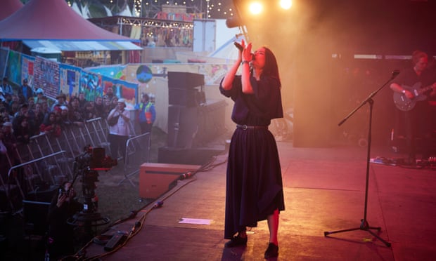 Mitski performing on the Park stage at Glastonbury.