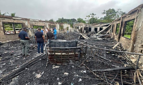Girl, 15, charged with 19 counts of murder after fire at school in Guyana