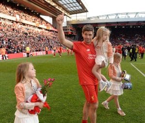 Steven Gerrard with his daughters on the pitch at Liverpool