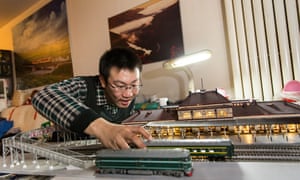Wang Wei working on a scale model of the Xizhimen station
