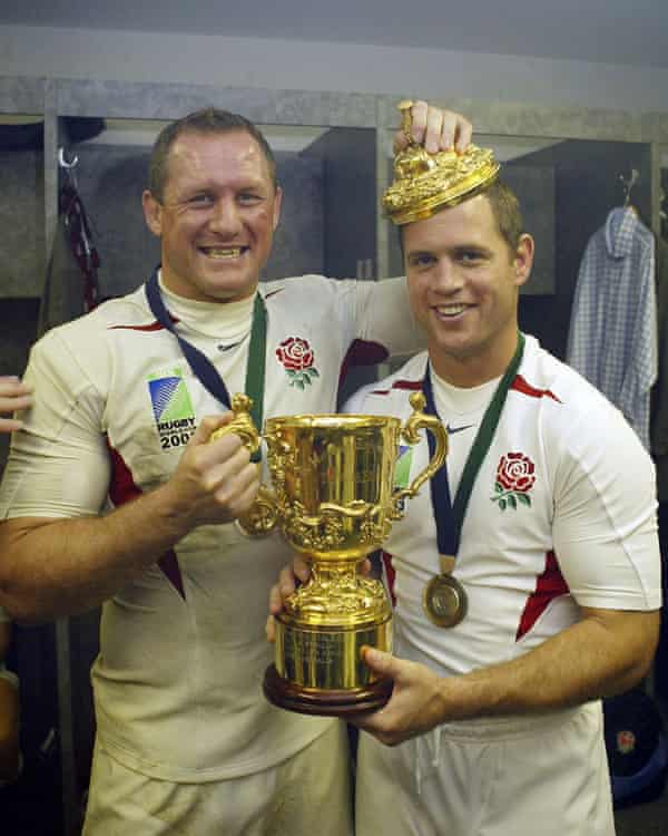 Kyran Bracken with Richard Hill hold the Webb Ellis Cup after England beat Australia in the 2003 Rugby World Cup final