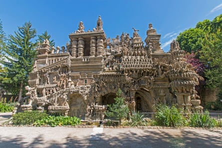 A surreal stone structure with many statues