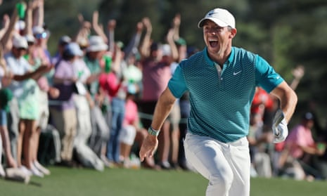 Rory McIlroy reacts after chipping in for birdie from the bunker on the 18th green in the final round of the 2022 Masters.