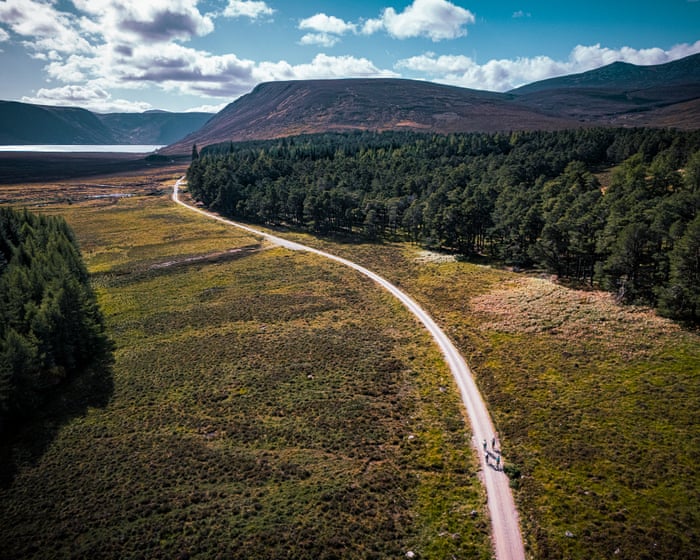 ‘It’s hard to imagine the fires of July’: a bike ride through the Cairngorms in Scotland