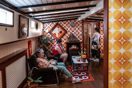 People sit down in one of the rooms in the museum
