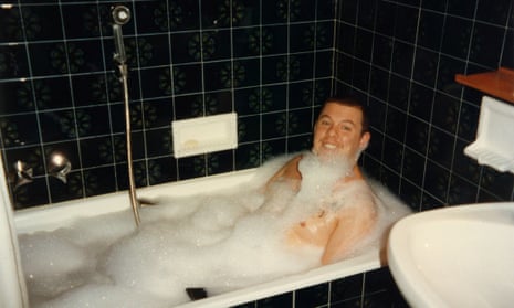 Fashion designer Alexander McQueen in the bath.
