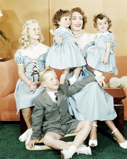 Joan Crawford with Christina, Christopher and her adopted twin daughters, Cindy and Cathy, in 1949.