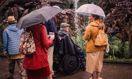 People under umbrellas at the RHS Chelsea flower show