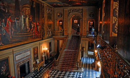 Dark ornate interior of the Painted Hall at Chatsworth.