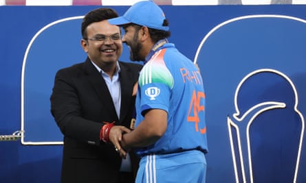 ICC Chairman Jay Shah greets India’s captain Rohit Sharma during the presentation ceremony