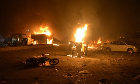 Burning vehicles after bomb blast in Quetta, Pakistan on Sunday.