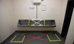 A urinal toilet with floor markings at Ellesmere Port.